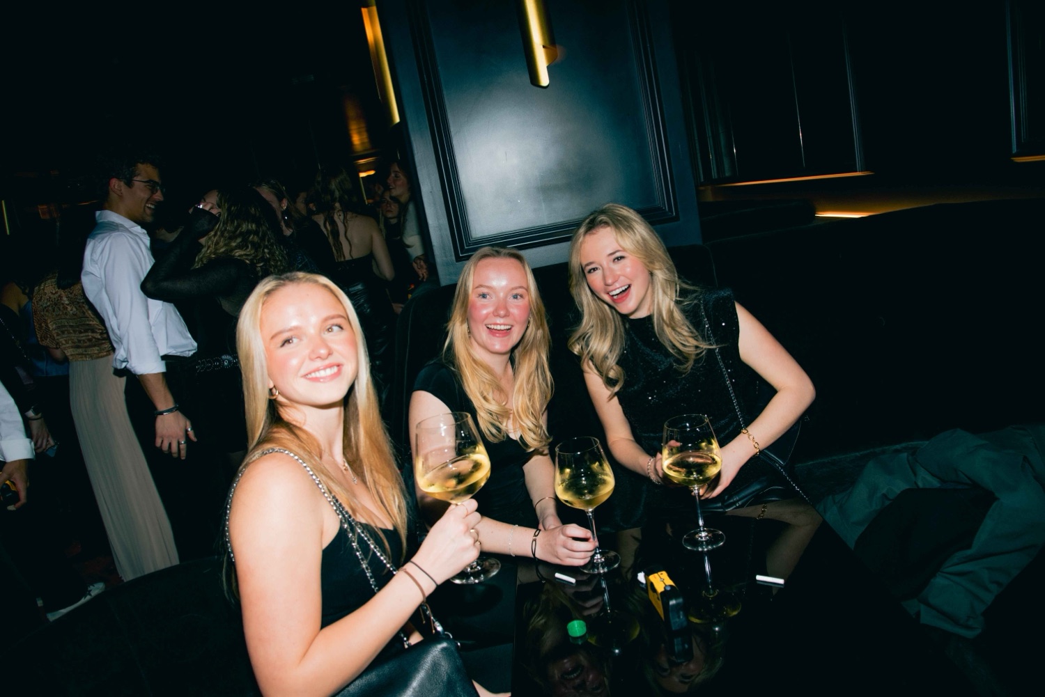 Members toasting with champagne